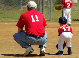 Dad and son playing ball