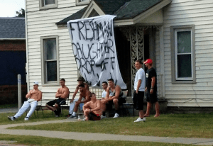 SUNY Cortland men post back to school sign